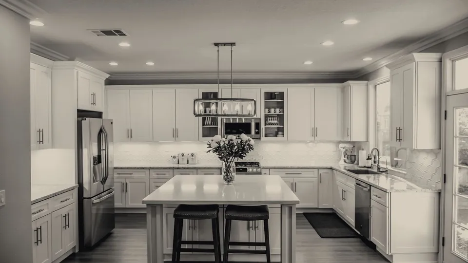 Kitchen with pot lights and pendant lighting